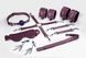 Набір Feral Feelings BDSM Kit 7 Burgundy, наручники, поножі, конектор, маска, паддл, кляп, затискачі SO8278 фото 1